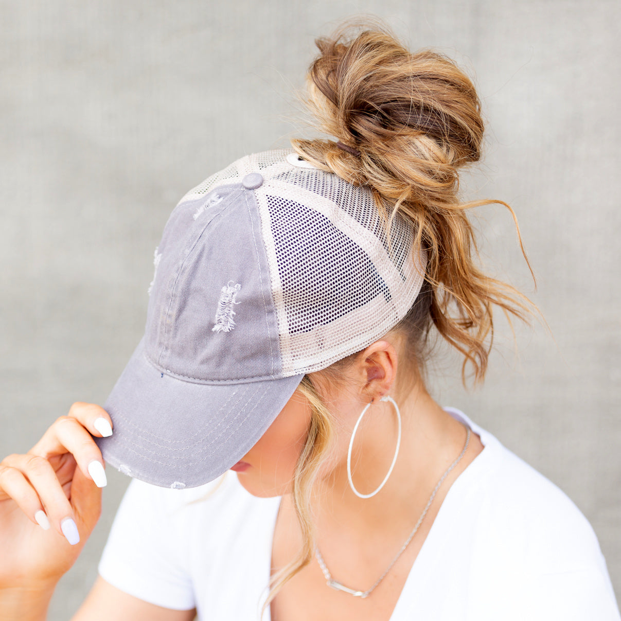 Distressed Messy Bun Cap | Adjustable No-Snag Opening